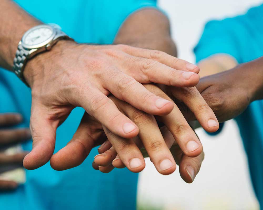 Hands of volunteers